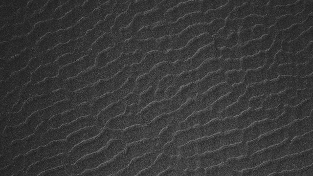 waves of black sand