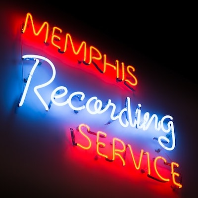 neon sign in white and red that says Memphis Recording Services